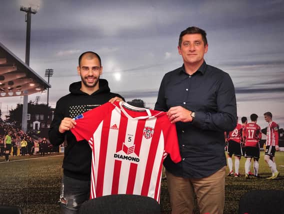 Derry City's new signing Conor Davis with manager Declan Devine. Picture by Kevin Morrison