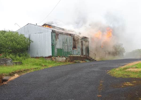 The building pictured as the fire took hold.