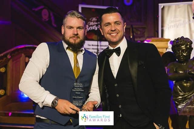 David Campbell, Chairperson of Circle of Support, receiving an award for 'Best Charity Supporting Families' at the Families First Awards in Belfast last month.