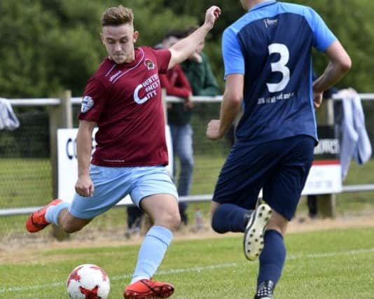 Institute's Mikhail Kennedy pictured in action against Newbuildings United on Saturday. DER2819-110KM
