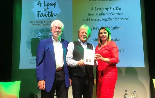 Jim OHara, chairperson of the Irish Cultural Centre, with Rev David Latimer and Foyle Sinn Fein MP Elisha McCallion.