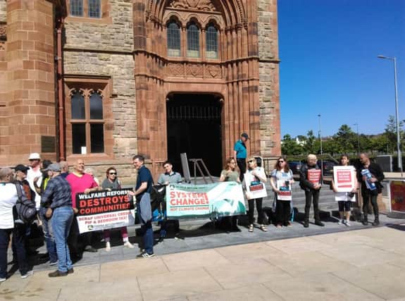 Climate action protesters outside the Guildhall during the recent meeting wqhere two motions were tabled by Colr. McCann and Colr. Durkan.