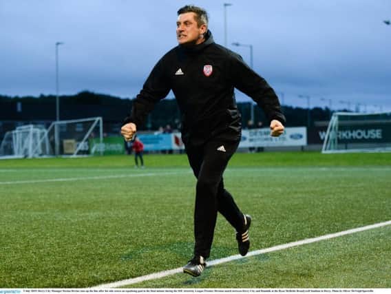 Derry City manager, Declan Devine races down the touchline to celebrate his side's late, late equaliser against Dundalk last weekend.
