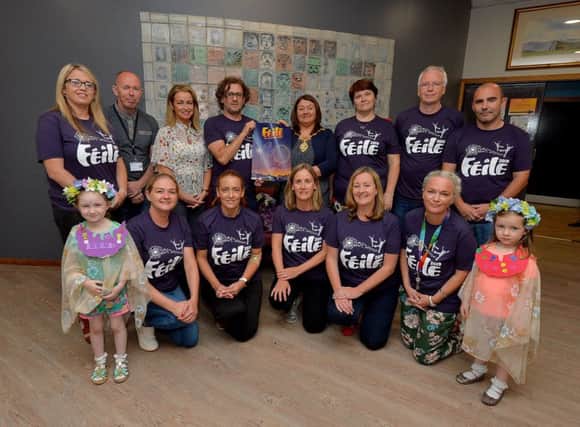 Paddy Danagher, Streets Alive co-ordinator, and the Mayor, Councillor Michaela Boyle pictured launching the programme of events for the Gasyard Feile 2019 at the Gasyard Centre yesterday afternoon. Included in the picture are Councillor Tina Burke, Feile sponsors, and representatives of participating groups. The 27th annual Feile will run from 7th-17th August.  DER2919GS-034