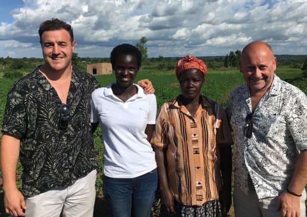 Self Help Africa Ambassador, Ulster Rugby's Rob Herring, and Denny Elliott, Head of NI, Self Help Africa visiting the work of the charity in Uganda
