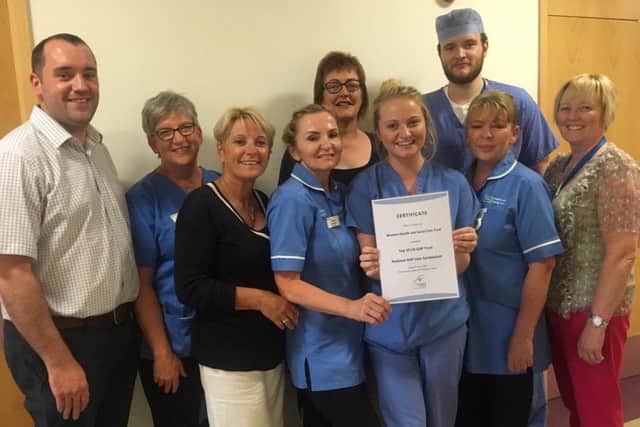 Maternity Staff at Altnagelvin Hospital pictured with their certificate in recognition of being named in the top ten Maternity Units in the UK for their work in preventing stillbirths by detecting small (gestational age) babies.