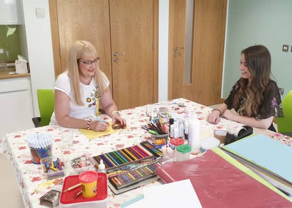 Shirley-Ann and Christina enjoying art therapy at the Macmillan Health and Well Being Campus, Altnagelvin Hospital