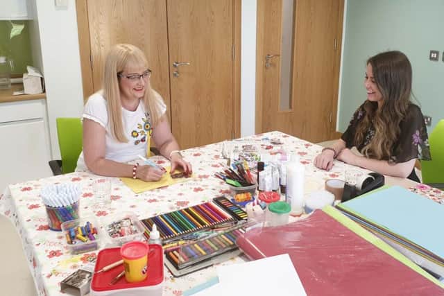 Shirley-Ann and Christina enjoying art therapy at the Macmillan Health and Well Being Campus, Altnagelvin Hospital