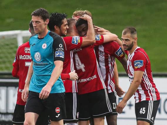 Derry's Junior Ogedi-Uzokwe celebrates breaking the deadlock in the first half.