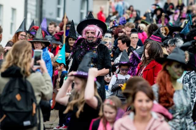 A bearded Witch stands tall among the hundreds of witches who descended on the Walls as Derry City and Strabane District Council launched it's Hallowe'en 2018 programme last year. Picture Martin McKeown. Inpresspics.com. 16.08.18