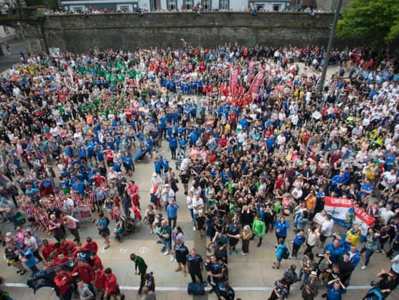 Players, managers, officials and supporters in the Guildhall during the O'Neills Foyle Cup parade.