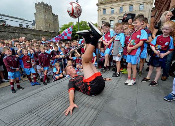 Tom Madden demonstrates his soccer skills, at Guildhall Square, during  the Foyle Cup City Centre parade on Tuesday morning last. DER3019GS-028