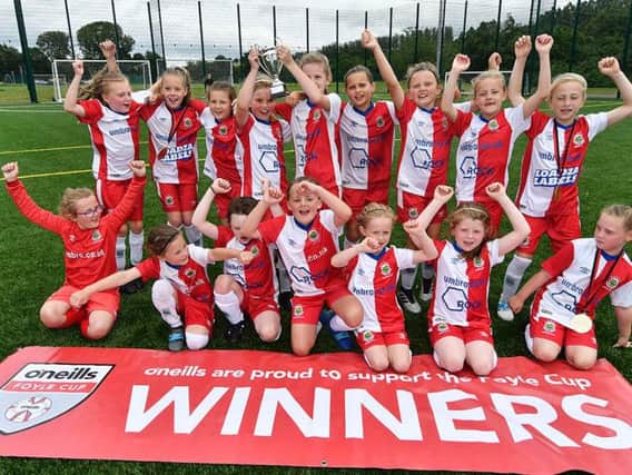 Linfield celebrate winning the girls U9 O'Neills Foyle Cup section.