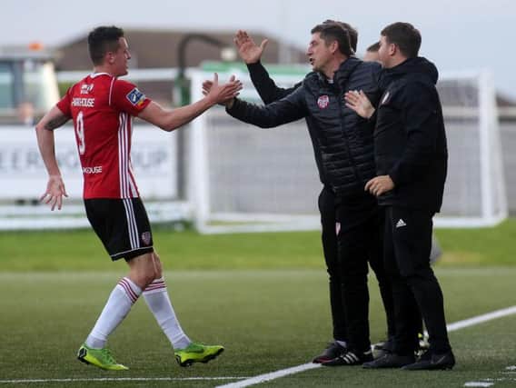 Declan Devine and his management team celebrate with goalscorer, David Parkhouse during the 2-0 win over Waterford at Brandywell.