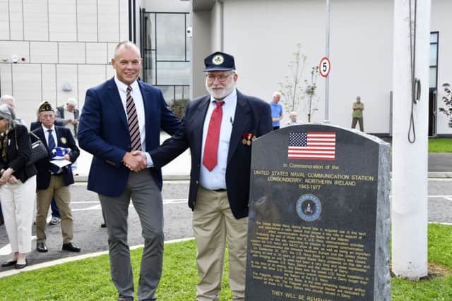 Neil Stewart, of Foyle College, and Dennis Kolodziej, Treasurer of the US Naval Communication Station Londonderry Alumni Association, pictured after unveiling the memorial stone in the grounds of Foyle College on Tuesday. DER3119-101KM