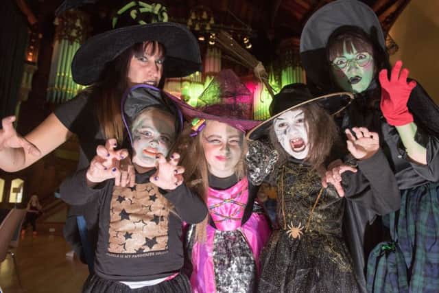 Winifred the Witch, right who cast a spell to summon, Trish Taylor, Ria Hanna, 5, Clara Gillespie, 9, and Tess Taylor, 7, with the hundreds of witches who descended on the Walls of Derry as Derry City and Strabane District Council launched its Hallowe'en programme last year. Picture Martin McKeown. Inpresspics.com. 16.08.18