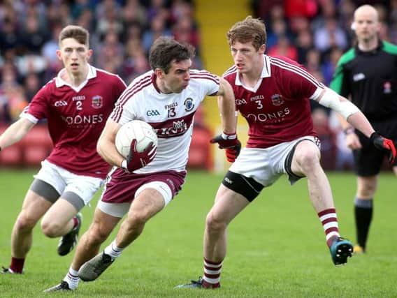 Benny Heron's return should give Ballinascreen the edge against Dungiven this weekend.