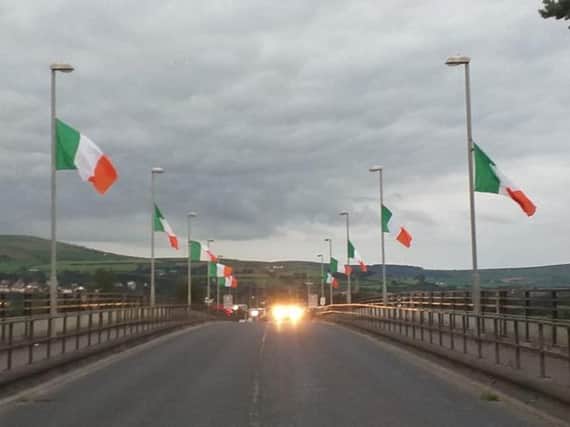 Tricolours on Lifford Bridge some of which were stolen overnight.
