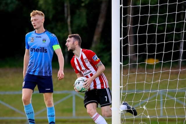 Jamie McDonagh grabs the ball after getting Derry back on level terms.