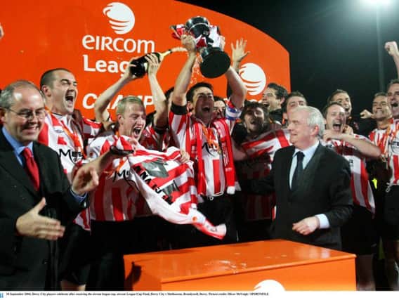 Derry City players celebrate after receiving the eircom league cup in September 2006 after the penalty shootout win over Shelbourne at Brandywell.