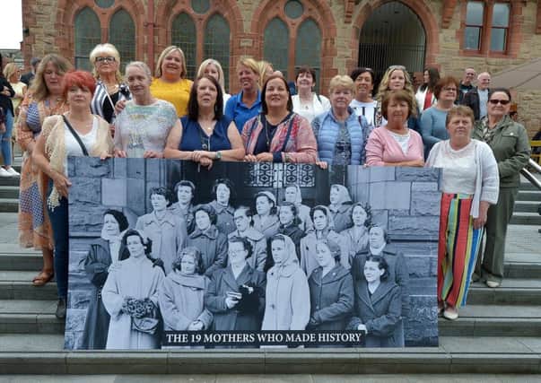 Daughters and grand-daughters, recreate a photo of Springtown Camp mothers who staged a housing protest outside the Guildhall 60 years ago.  DER3119GS-026