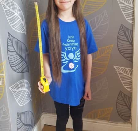 Katie-Leigh before she cut 14 inches off her hair