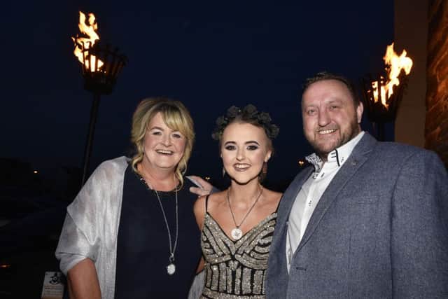 Alexandra Johnston pictured with her proud parents Karen and Andre when she arrived for her suprise 'An Evening with Alexandra' event held in the Gasyard Centre by the Pink Ladies and the Gasyard Development Trust. DER1317-103KM