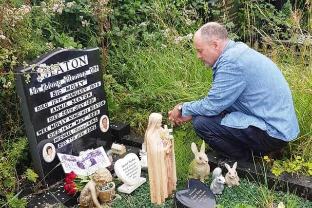 Steve Bolton at the grave of Big Molly Seaton on the outskirts of Belfast.