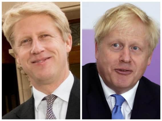 Jo Johnson (left) and his brother and prime minister Boris Johnson.