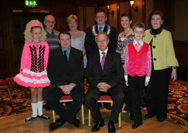 Elizabeth McConomy, standing, third from left, at the launch of an Ulster Feis several years ago. Elizabeth is currently fighting cancer.