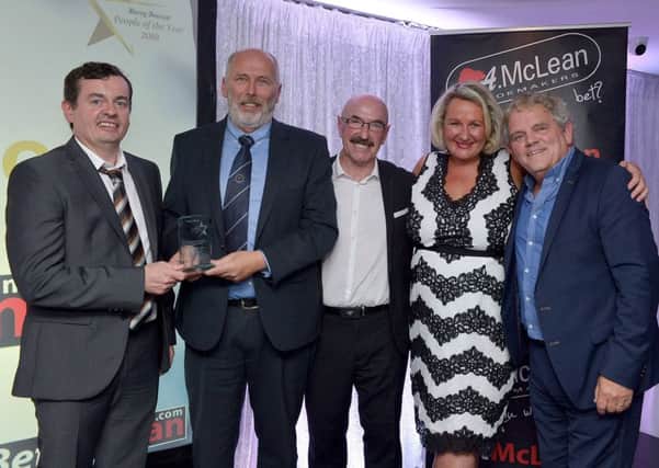 Bill Anderson, Chairman, Institute FC, receives the Sports Volunteer of the Year Award, from Sean Gallagher, BetMcLean, principal sponsor, at the Derry Journal People of the Year Awards held recently in the Waterfoot Hotel. Included in the photograph are Liam Becket MBE, Andrena OPrey, JPIMedia and Adrian Logan, compere. DER3619GS  076