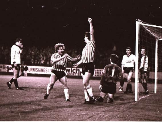 Derry City's Johnny Speak celebrates with Noel Larkin after the striker put the Candy Stripes 2-0 up in the 1988 League Cup final against Dundalk at Oriel Park.