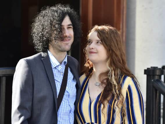 Emma DeSouza and Jake DeSouza outside the Royal Courts of Justice in Belfast. (Photo: Pacemaker)
