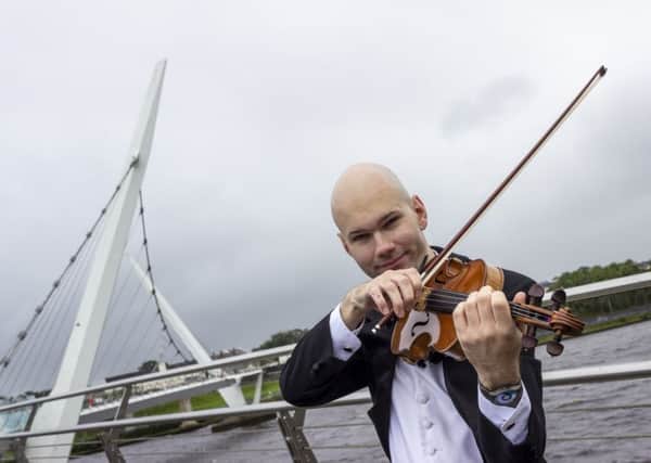 Krzysztof Rucinski, violinist with the Ulster Orchestra was in Derry to today to help promote a season of events coming to the City next month. Pictures by Darron Mark Photography | DMfotoNI
