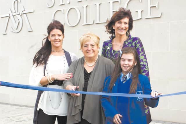 Three generations cut the ribbon to officially open St. Mary's College at their new school on Northland Road. Mrs Connie Hegarty (nee Cooper) who was a new pupil in 1959 at Fanad Drive when the school opened,  her granddaughter Hannah Lynch was a new Year 8 pupil in 2010 at Northland Road. Connies daughter Mrs Danielle Lynch, Hannahs mum also attended St Marys College. Also included is Marie Lindsay, principal.