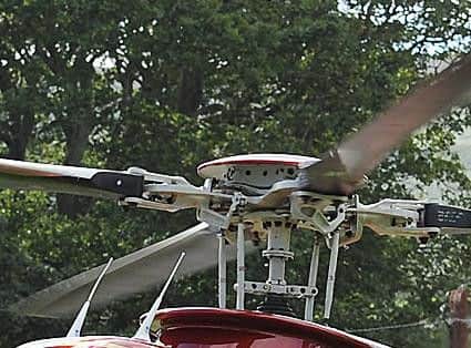 The helicopter's rotor made contact with the ground.