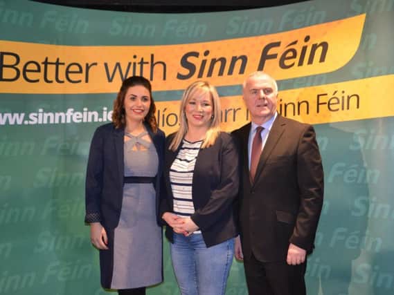 Sinn Fein leader in the north Michelle O'Neill pictured previously in Derry with Foyle MP Elisha McCallion and MLA Raymond McCartney.