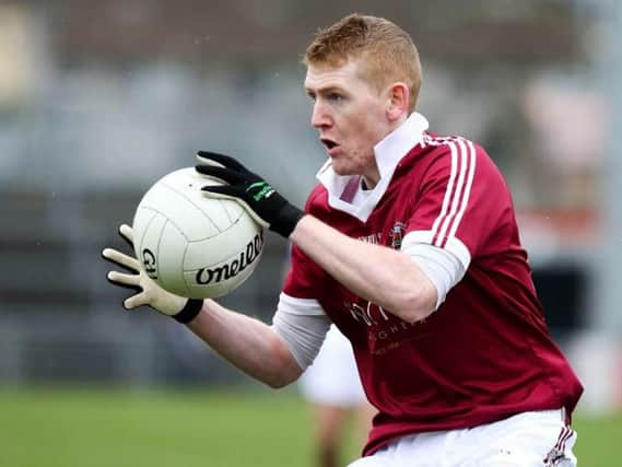 Christopher 'Sammy' Bradley grabbed the crucial second half goal as Slaughtneil advanced to the Derry Senior Football Championship semi-finals.