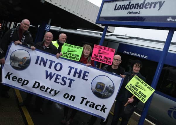 STATION PROTEST. . . .The Into The West 'Keep Derry on Track' group pictured protesting at Waterside Railway Station last month. DER4514MC038