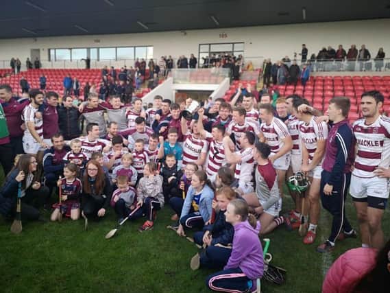 Slaughtneil celebrate after defeating Kevin Lynch's to secure a seventh successive Derry Senior Hurling Championship title.