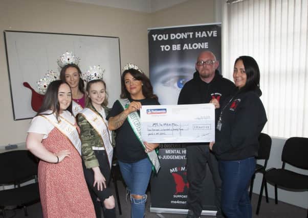 Emma Brolly, handing over a cheque for £11,623.01 to Pauline McCloskey and John Doran, ME4Mental Support Group, Queen Street, Derry. The monies were raised though a beauty pageant held at the Waterfoot Hotel on 14th September, 2019. Included in photo are Millie Doran, Zoe Stewart and Rebecca Keys.