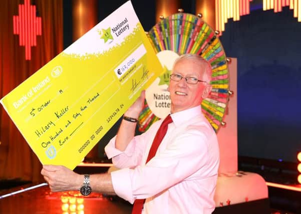 Hilary Keller, pictured with his cheque for E163,000.