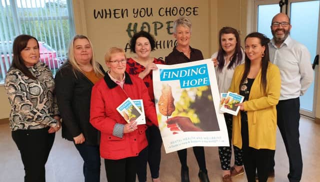Western Trust Recovery College are delighted to launch 'Finding Hope' Mental Health and Wellbeing booklet on World Mental Health Day 10 October 2019 from left to right are: Michelle McGlone, Volunteer; Sharon Vaughan, Peer Trainer; Julie Kyle, Peer Trainer; Bernadette Donaghey, Peer Trainer; Olive Young, Recovery College Coordinator; Brona Dyson, Peer Trainer; Karen Elliott, Peer Educator and Stephen Donnelly, Recovery Team Manager.