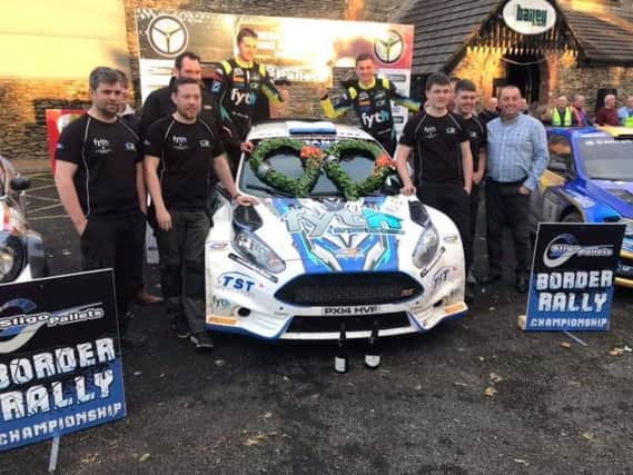 Derry driver, Callum Devine pictured with his team after winning the Donegal Harvest Rally at the weekend.