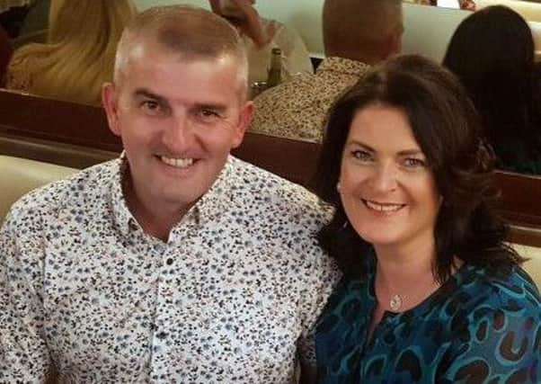 Adoptive parents, Derry couple Eoin and Denise.