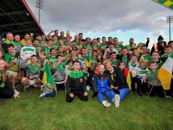 Foreglen players and supporters celebrate their Intermediate Championship victory in Celtic Park.