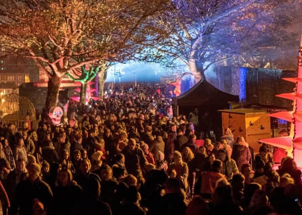 Some of the thousands of people who enjoyed the installations and performers during the first night of the Awakening of the cit's 400 years old Walls last year. Picture Martin McKeown. Inpresspics.com. 28.10.18