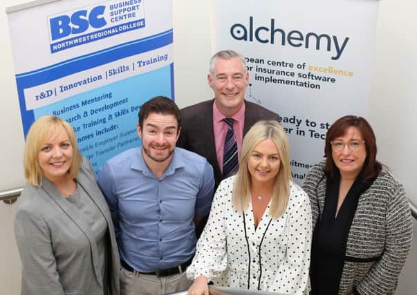 Pictured at Alchemy Technology Services premises in Derry are (front centre) previous Academy graduates Colin Montgomery and Rachel Gallagher with (left) Sinead Hawkins of North West Regional College, Graeme Wilkinson of DfE and Anne ONeill of Alchemy. (Lorcan Doherty Photography)