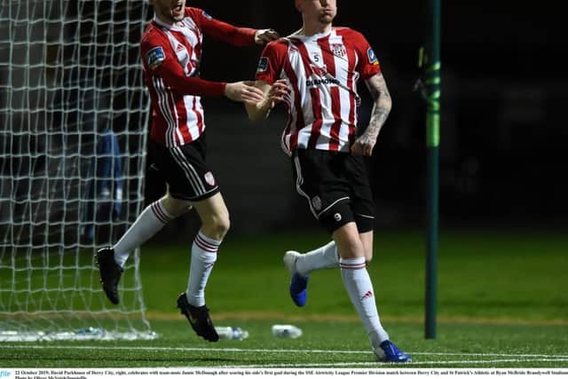 David Parkhouse celebrates with Jamie McDonagh after giving Derry City the lead at the start of the second half.