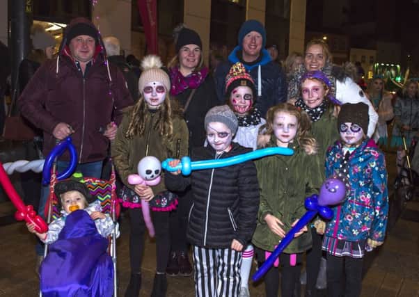 The Morrison and Sproule families dress for the Halloween celebrations in the city centre last year. DER4418GS012